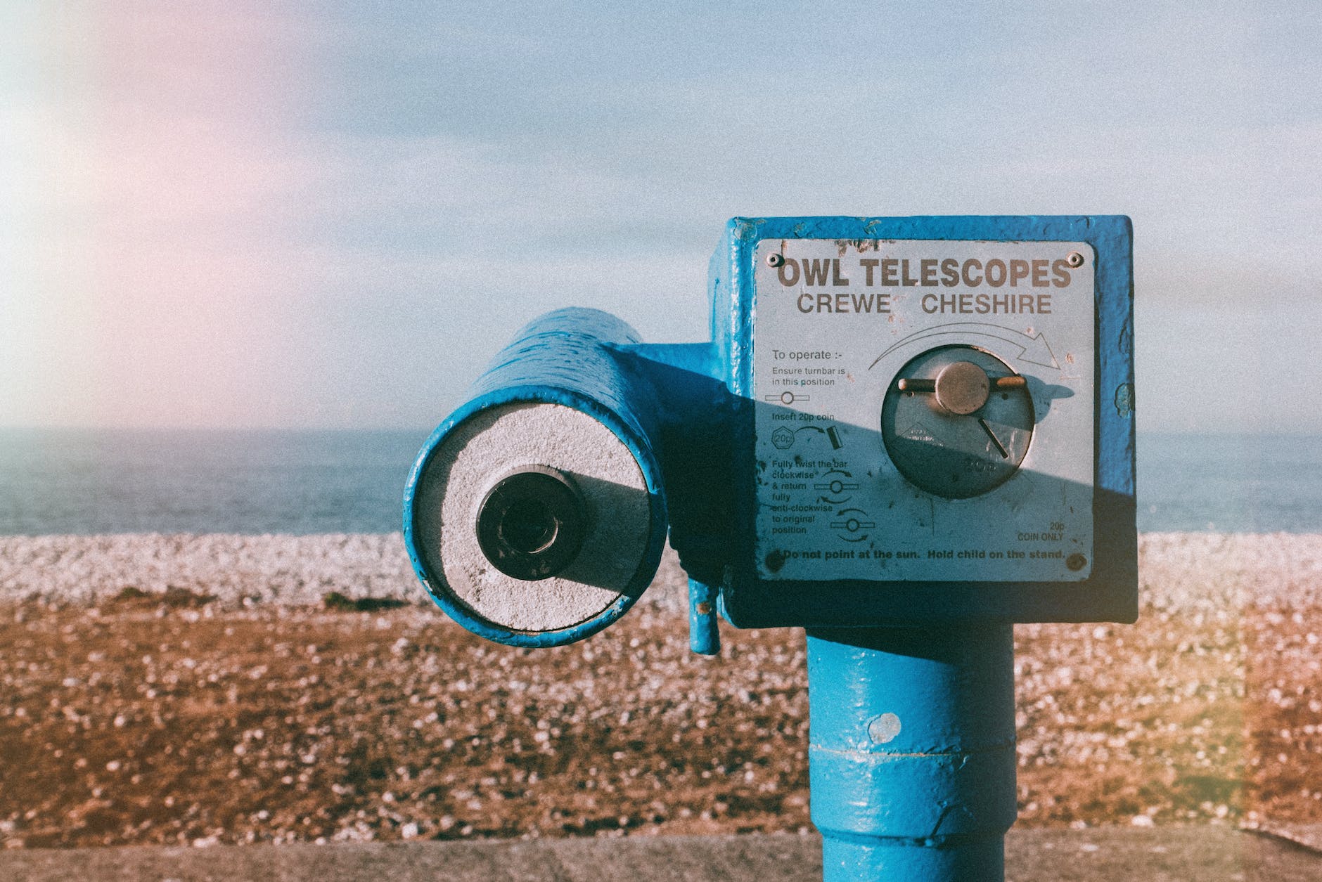 selective focus photography of blue owl telescopes